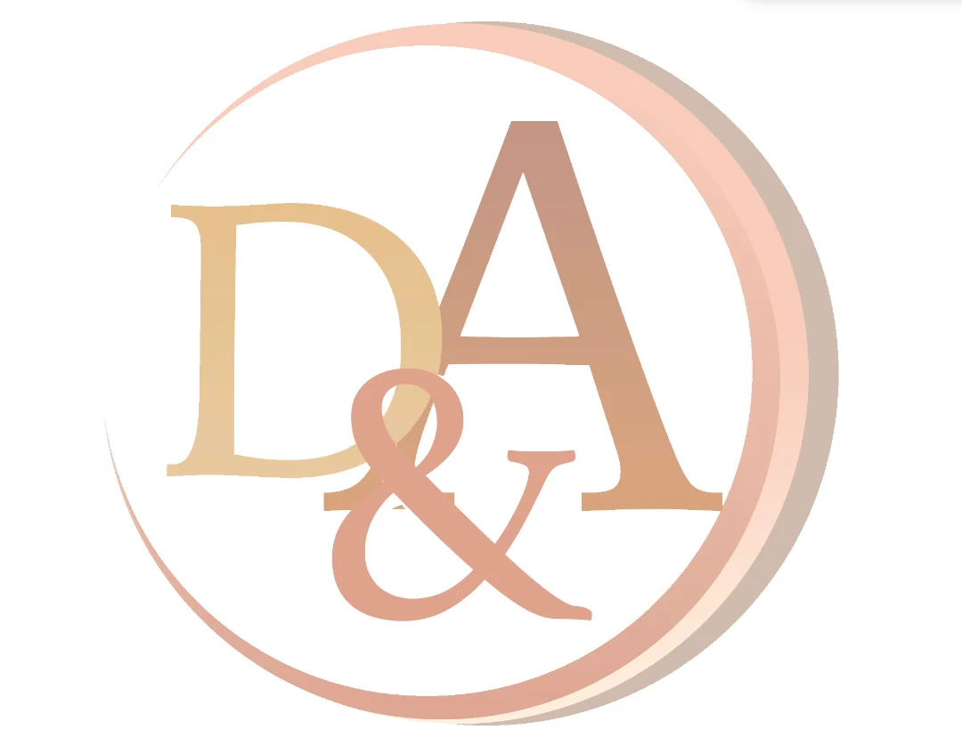 Circular logo with D&A initials in gold and rose gold tones with ampersand symbol